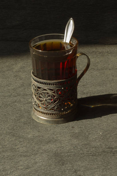 istock A glass of tea in a cup holder 696314454