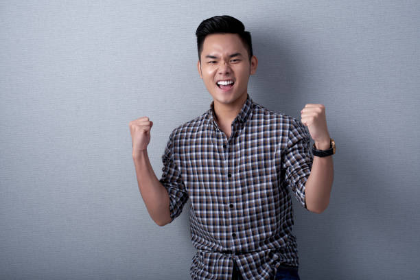 istock Successful Businessman Celebrating Victory 696317768