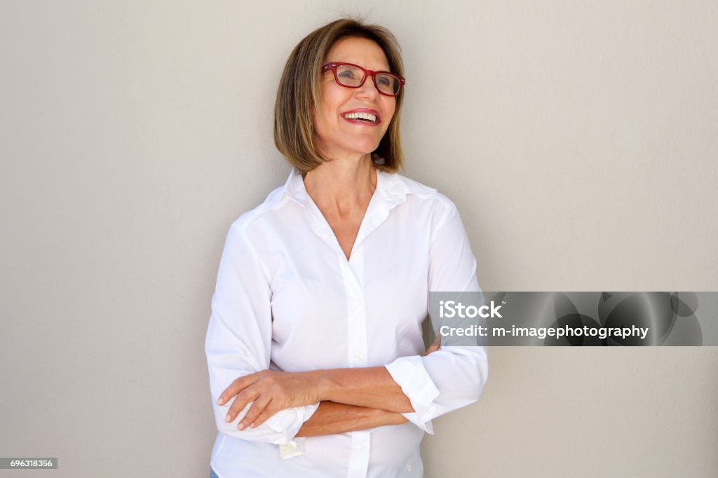 business woman with glasses smiling Portrait of business woman with glasses smiling Women Stock Photo