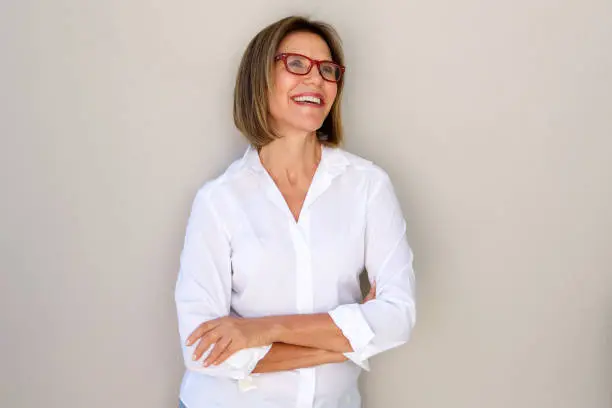 Photo of business woman with glasses smiling