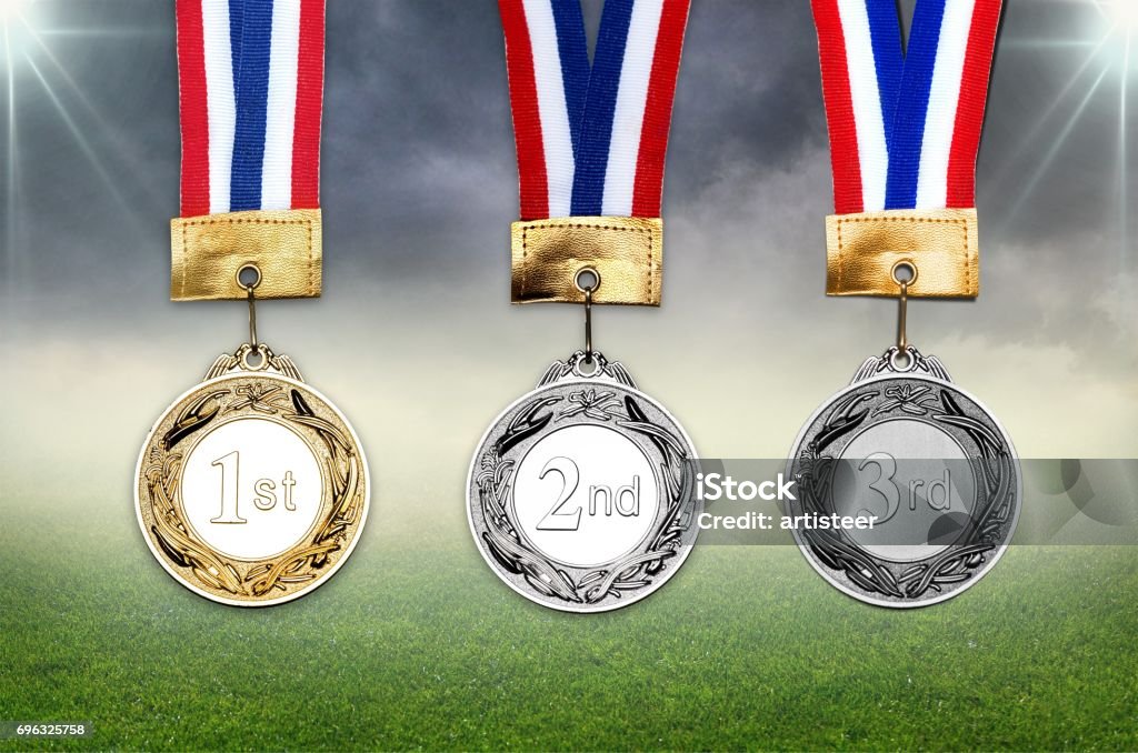 Award. Gold, silver and bronze medals with ribbons Achievement Stock Photo