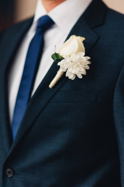 istock Wedding flower boutonniere groom 696328994