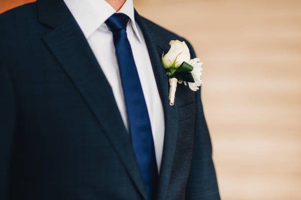 istock Wedding flower boutonniere groom 696329060