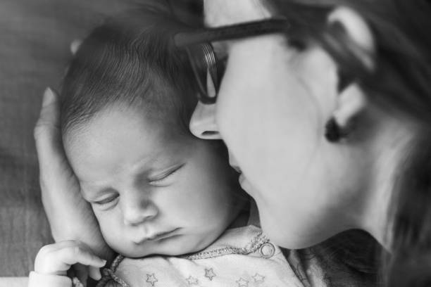 istock Mother with newborn baby 696329676
