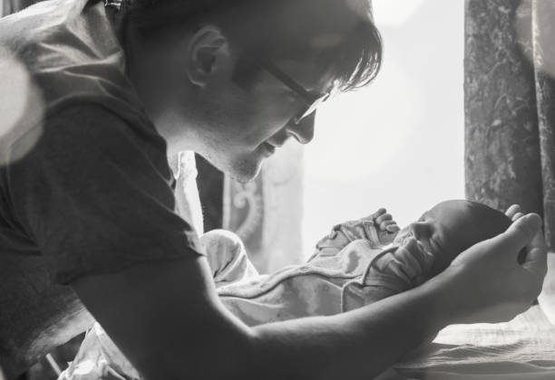istock Father with newborn baby 696329732