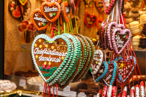 Decorated Gingerbread Heart at the Christmas Market - Innsbruck, Austria Decorated Gingerbread Heart at the Christmas Market - Innsbruck, Austria christmas market photos stock pictures, royalty-free photos & images