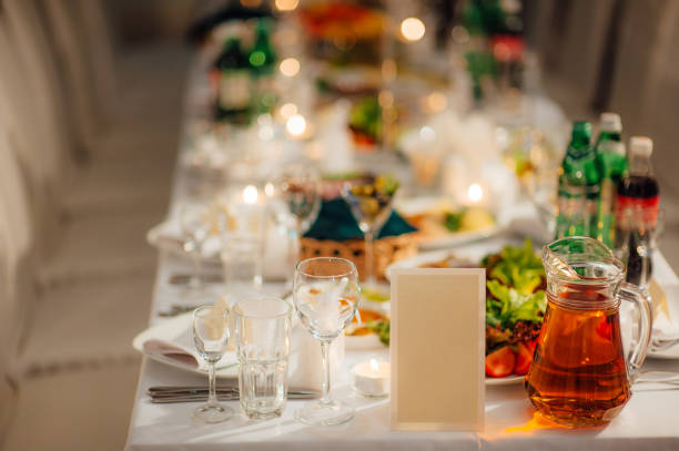 istock Blank bright yellow place card on wood table 696337820