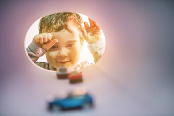 Children playing toys Cars on house