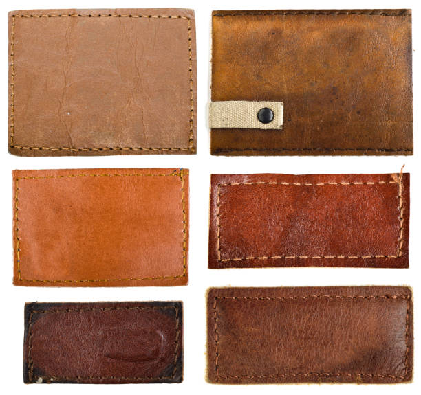 istock Leather jeans labels, leather tags.isolated on white background 696338402