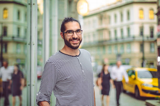 istock Outdoors portrait of a young man 696342222
