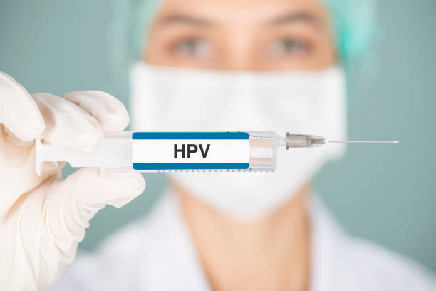 HPV Virus Nurse holding syringe. Human Papilloma Virus. human papilloma virus photos stock pictures, royalty-free photos & images
