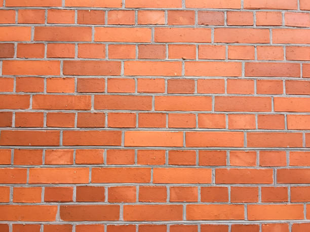 istock Brick wall texture, brick wall background, brick wall for interior or exterior design with copy space for text or image. Red organic brick wall texture background 696360382