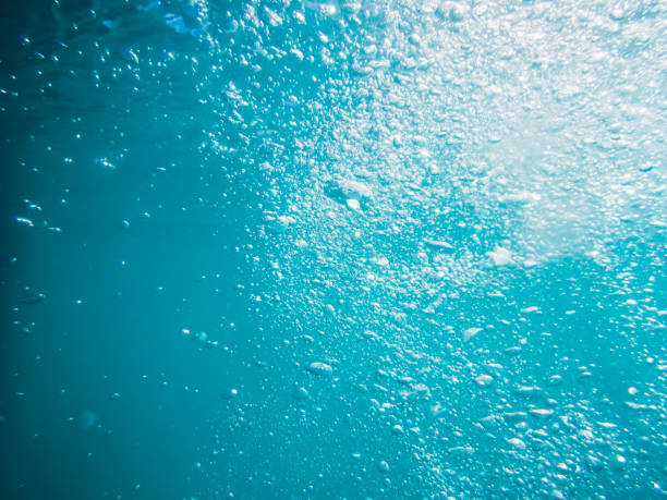 istock Bubbles underwater in sea. Texture in ocean 696364904