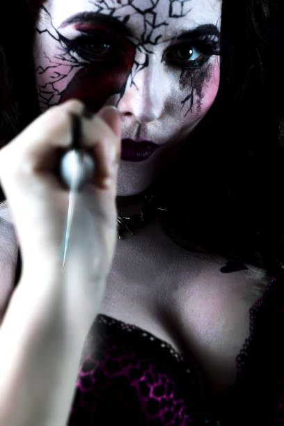 istock awesome pinup beautiful girl with knife 696371340