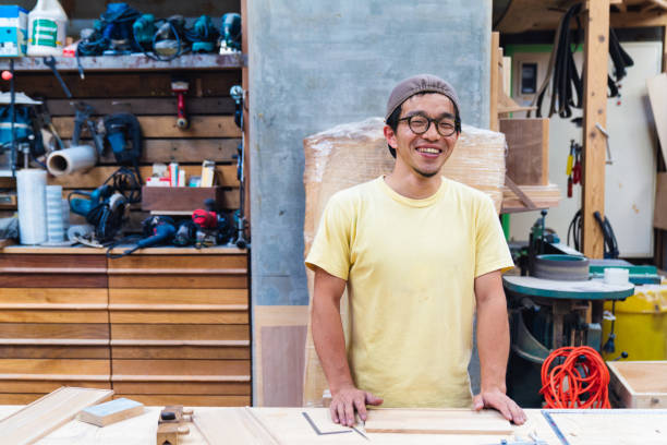 istock Portrait of a craftsman in his workshop 696371416