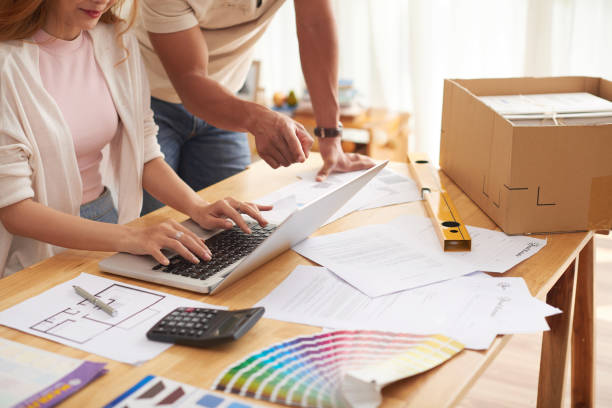 istock Man and Woman Planning Interior Design 696371838