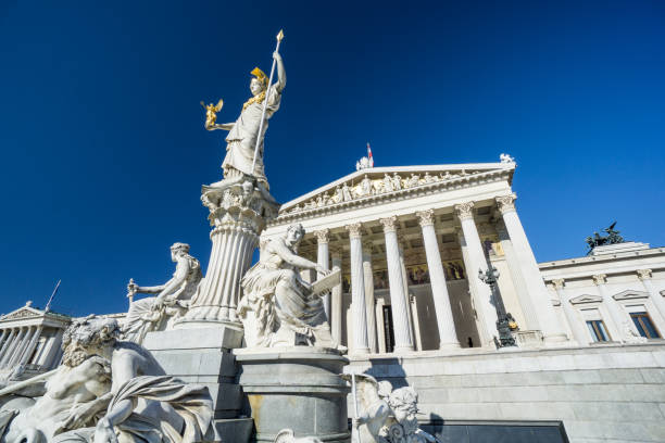 istock Austrian parliament with clear blue sky 696373574