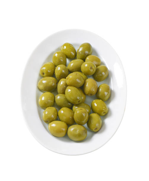 istock plate of green olives 696376772