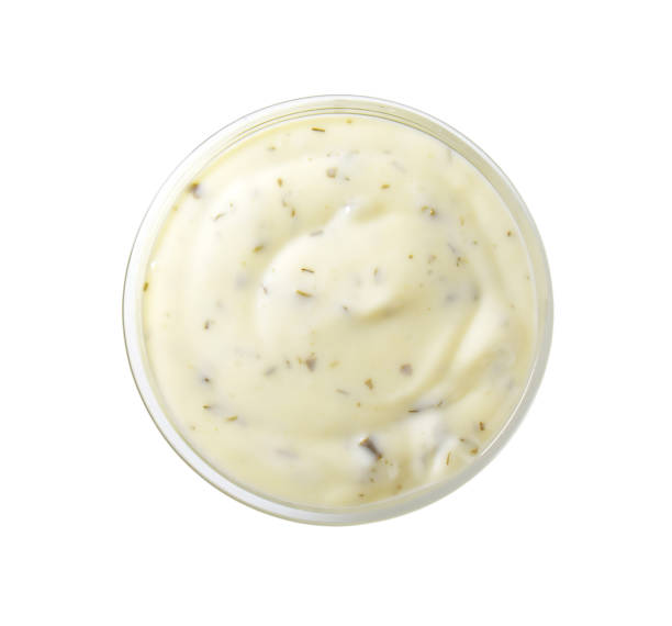 creamy salad dressing bowl of creamy salad dressing on white background salad dressing photos stock pictures, royalty-free photos & images