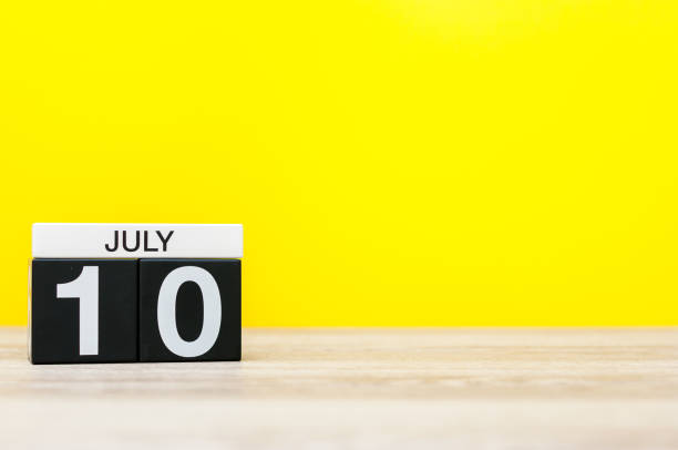 istock July 10th. Image of july 10, calendar on yellow background. Summer time. With empty space for text 696379632