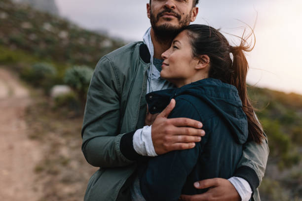 istock Loving young couple in countryside 696383224