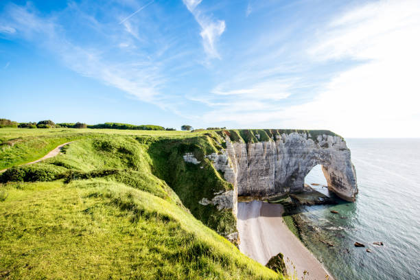 istock Landscape view on the rocky coastline in Etretat 696384882