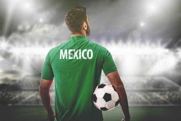istock Mexico Fan / Sport Player on uniform celebrating 696391072