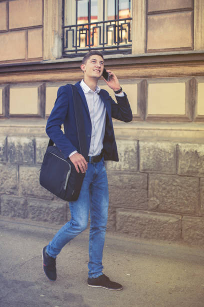 istock Attractive businessman talking on a phone 696398906