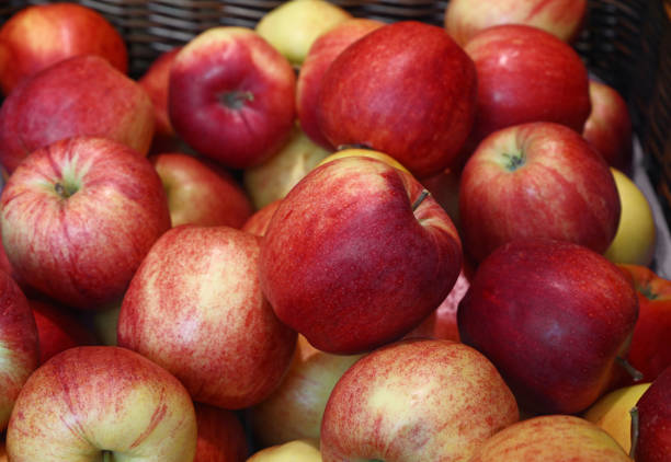 istock Fresh red apples on retail market close up 696405032