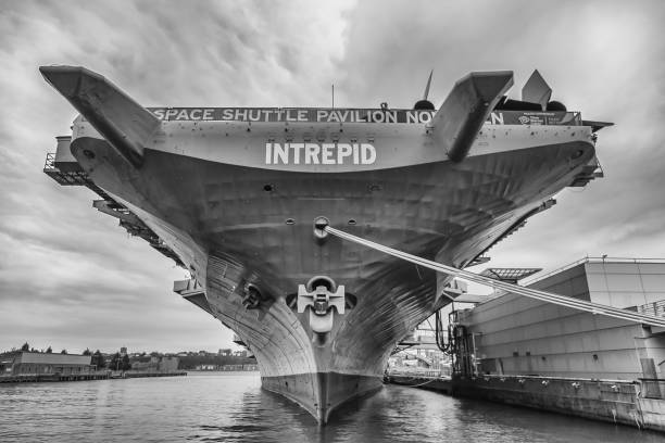 New York, New York, USA - October 23, 2012: The USS Intrepid World War II era aircraft carrier docked on Manhattan's East Side on a cloudy day in the fall of 2012.