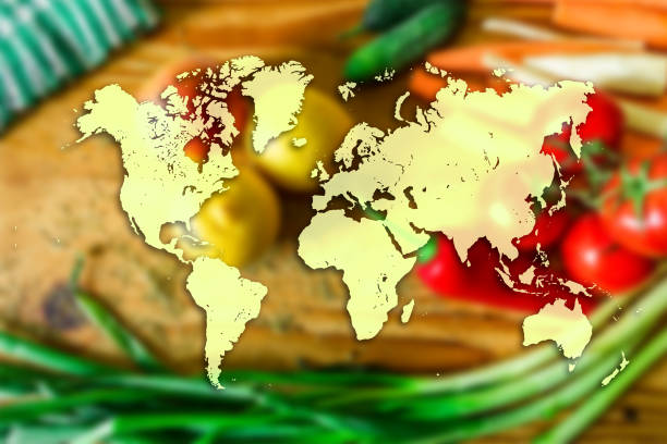 istock World map on vegetables and fruits background 696410672