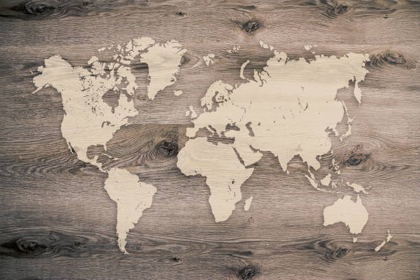 istock World map on wooden planks background 696410732