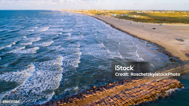 Padre Island Paradise Nature Escape Golden Hour As Gorgoues Sunlight Hits The Beach And Waves Rolling Onto The Shore Stock Photo - Download Image Now