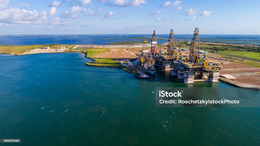 Off Shore Oil Drilling Rig being Deconstructed on Island on the Gulf of Texas Texas Stock Photo