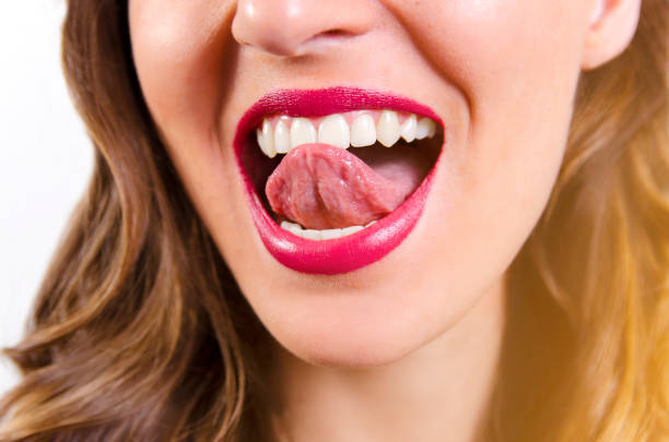 istock Young woman with perfect teeth 696436358