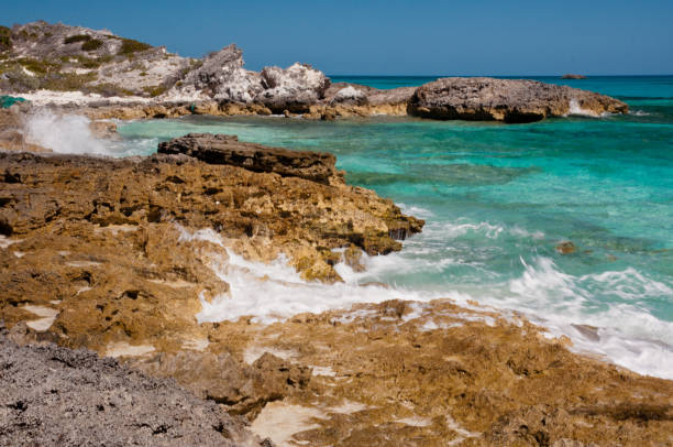 istock Rocky Cliff at edge of ocean 696441092