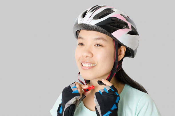 istock Woman wearing bicycle helmet ready to cycling 696448088