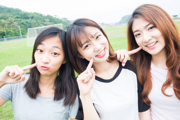 istock Group of happy friends taking a selfie 696454282