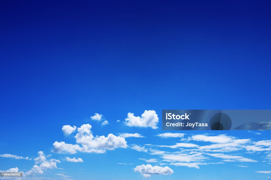 beautiful white clouds on blue sky for background and design it is beautiful white clouds on blue sky for background and design. Sky Stock Photo