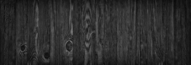 istock Black wood texture, empty wooden table surface or wall as background 696461100