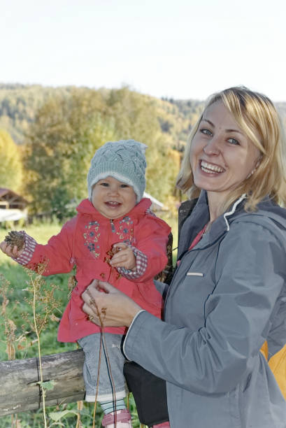 istock Mother and Child in Nature in summer 696470142