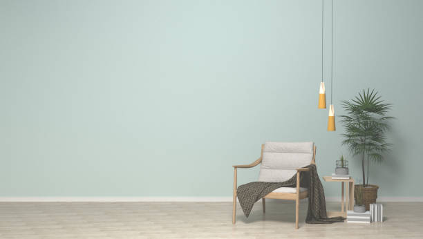 istock Simple interior with white armchair,and plant on clean wall background.3D rendering. 696472006