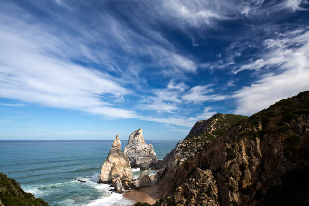 Ursa Beach in Sintra The Ursa Beach (Praia da Ursa) is a natural treasure at the end of a difficult cliff descent located in the Sintra Mountain, near Lisbon, Portugal serra de sintra stock pictures, royalty-free photos & images