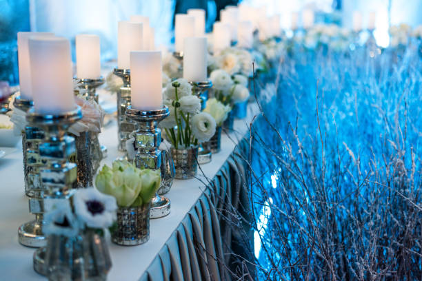 istock Wedding decor. Candles in candelabrum and roses 696488092