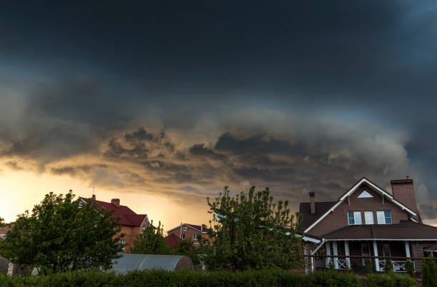 A storm rolling in over a calm neighborhood. 