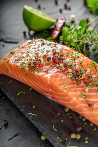 istock Fresh Raw Salmon Steak with Sea Salt and Spices, Herb 696492798