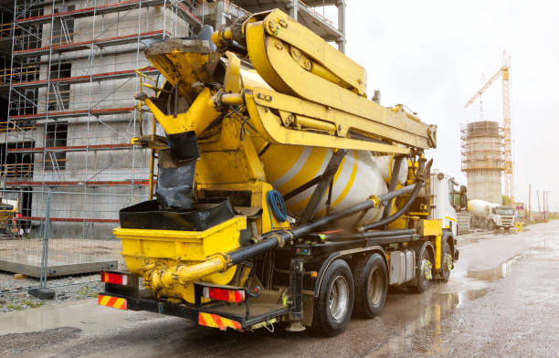 istock Concrete mixer truck on construction site. 696493246
