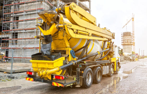 istock Concrete mixer truck on construction site. HDR Photo. 696493252