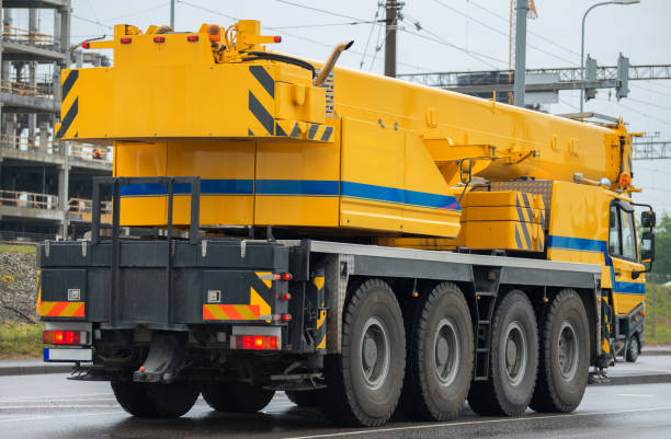 istock Big crane truck on the road. 696493294