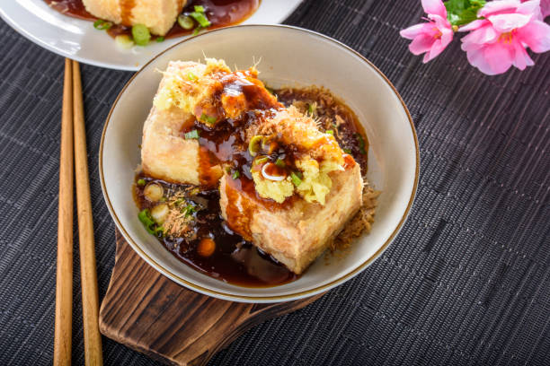 istock Agedashi, Deep Fried, Tofu with Ground Ginger , Scallion and Soy Sauce 696496316
